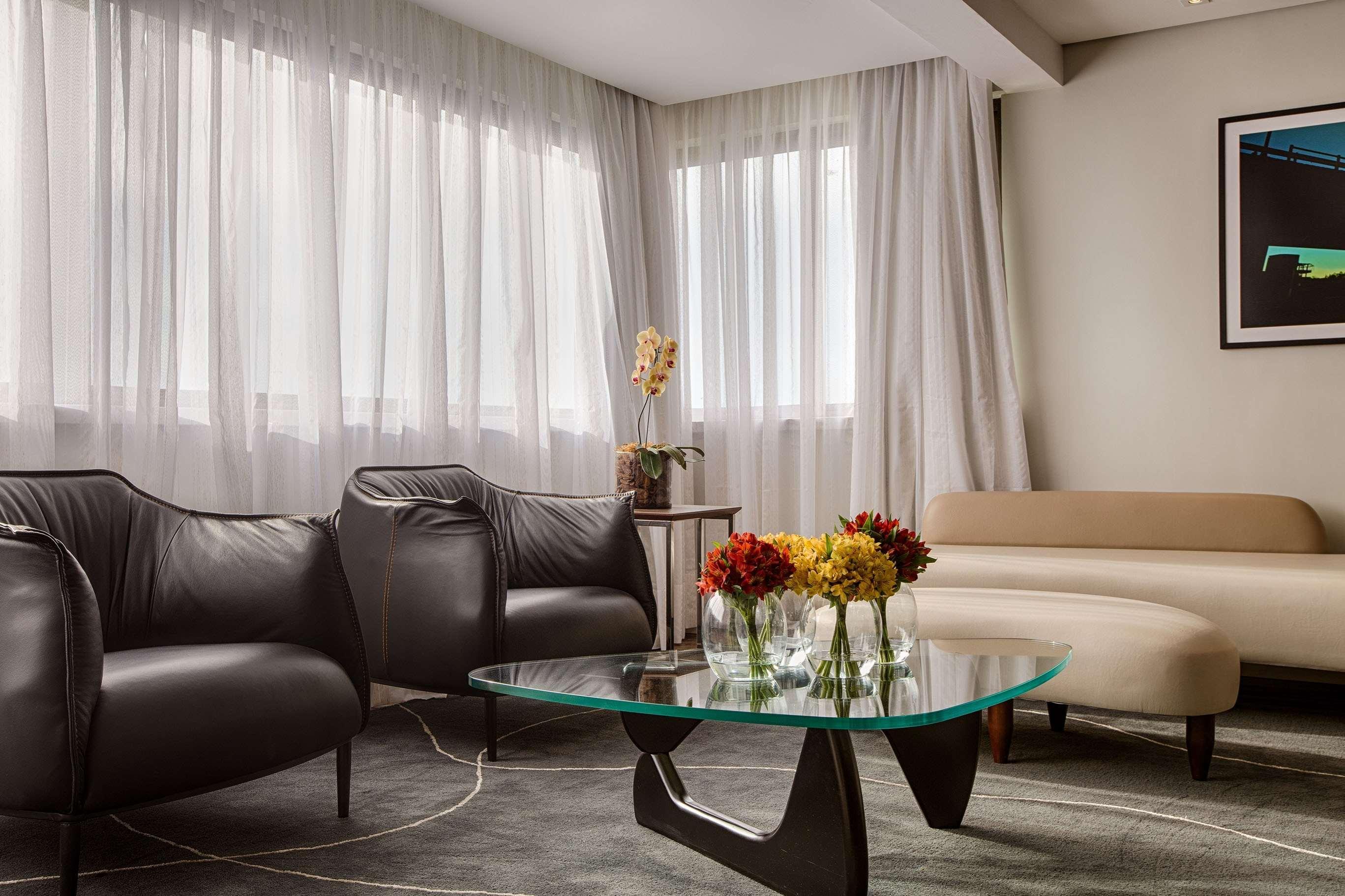 Art Hotel Transamerica Collection Porto Alegre Bagian luar foto A living room at the hotel