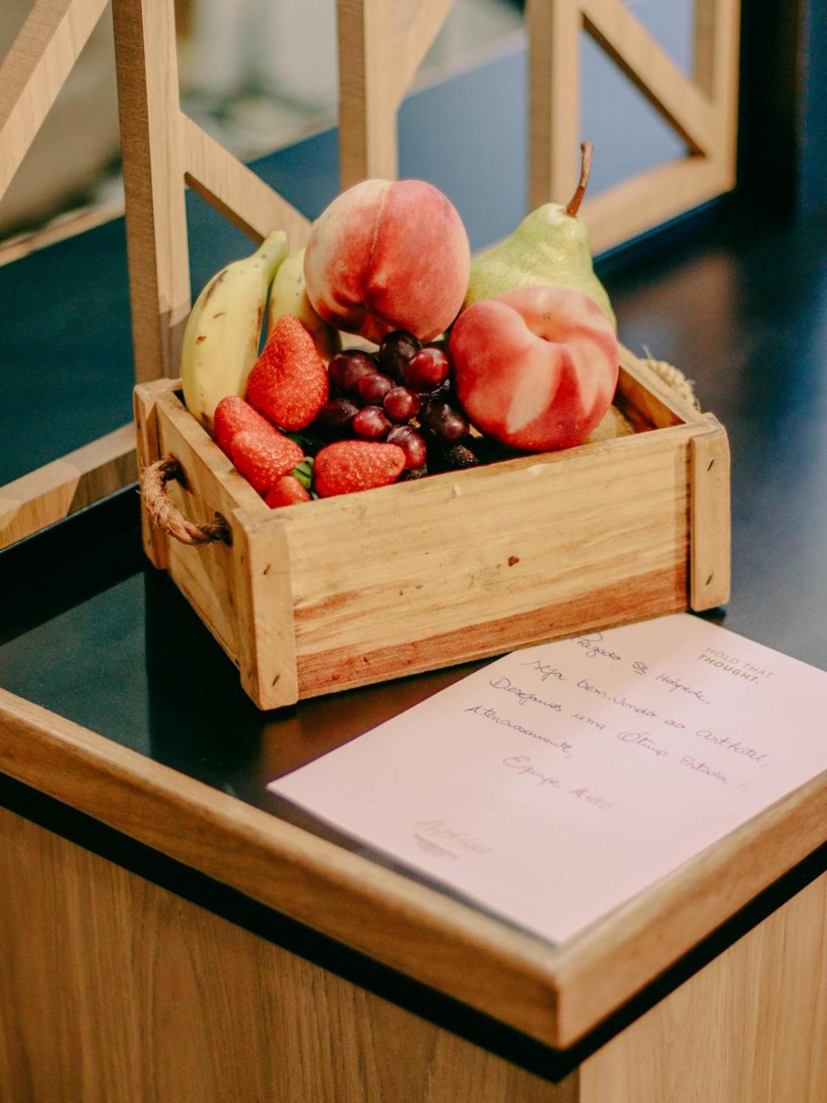 Art Hotel Transamerica Collection Porto Alegre Bagian luar foto Fruit and menu at a restaurant